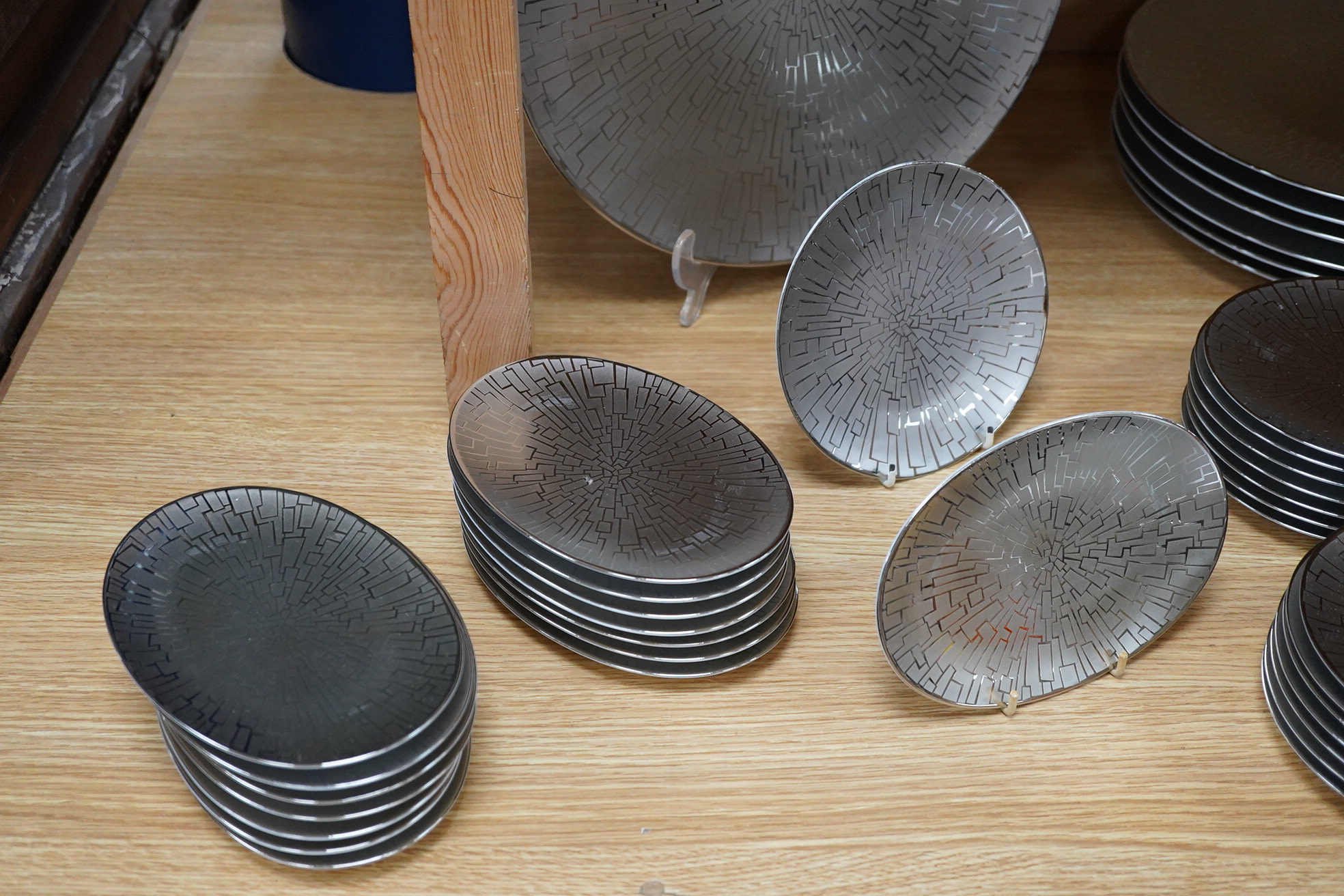 A collection of Rosenthal studio line TAC Gropius Skin platinum dinnerware, largest 33cm in diameter